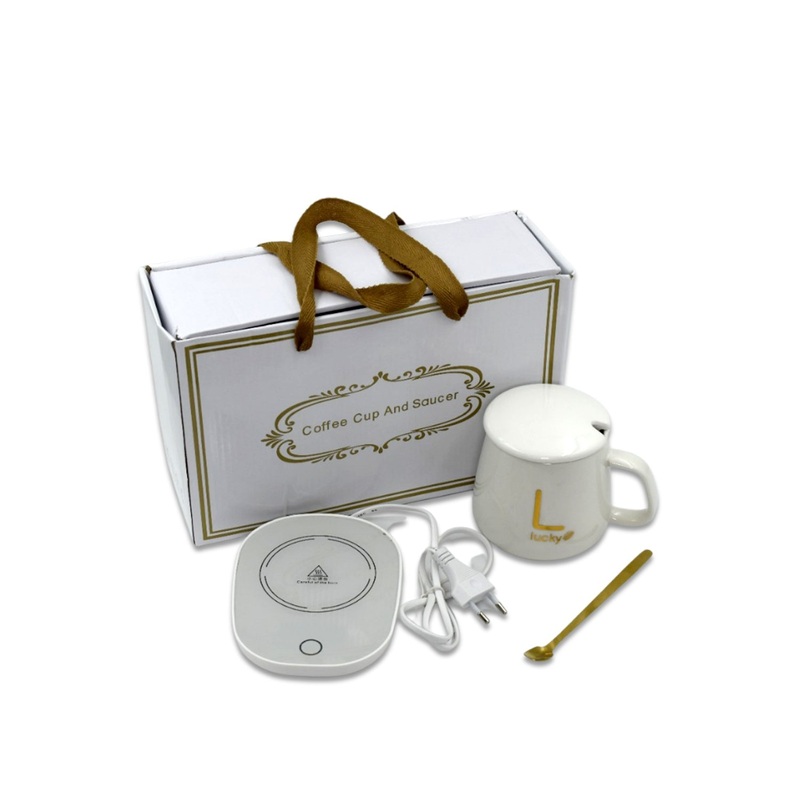 2792 Coffee Mug And Warmer For Having Coffee Along With The Warmer That Keeps It Hot.